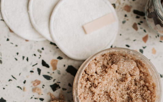 exfoliating scrub and cotton pads